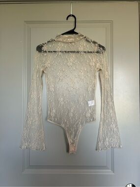 Chelsea & Violet Sheer Lace Long Bell Sleeve Bodysuit - in Floral Cream